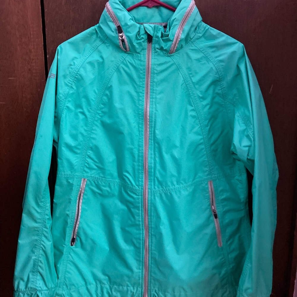 Turquoise wind breaker